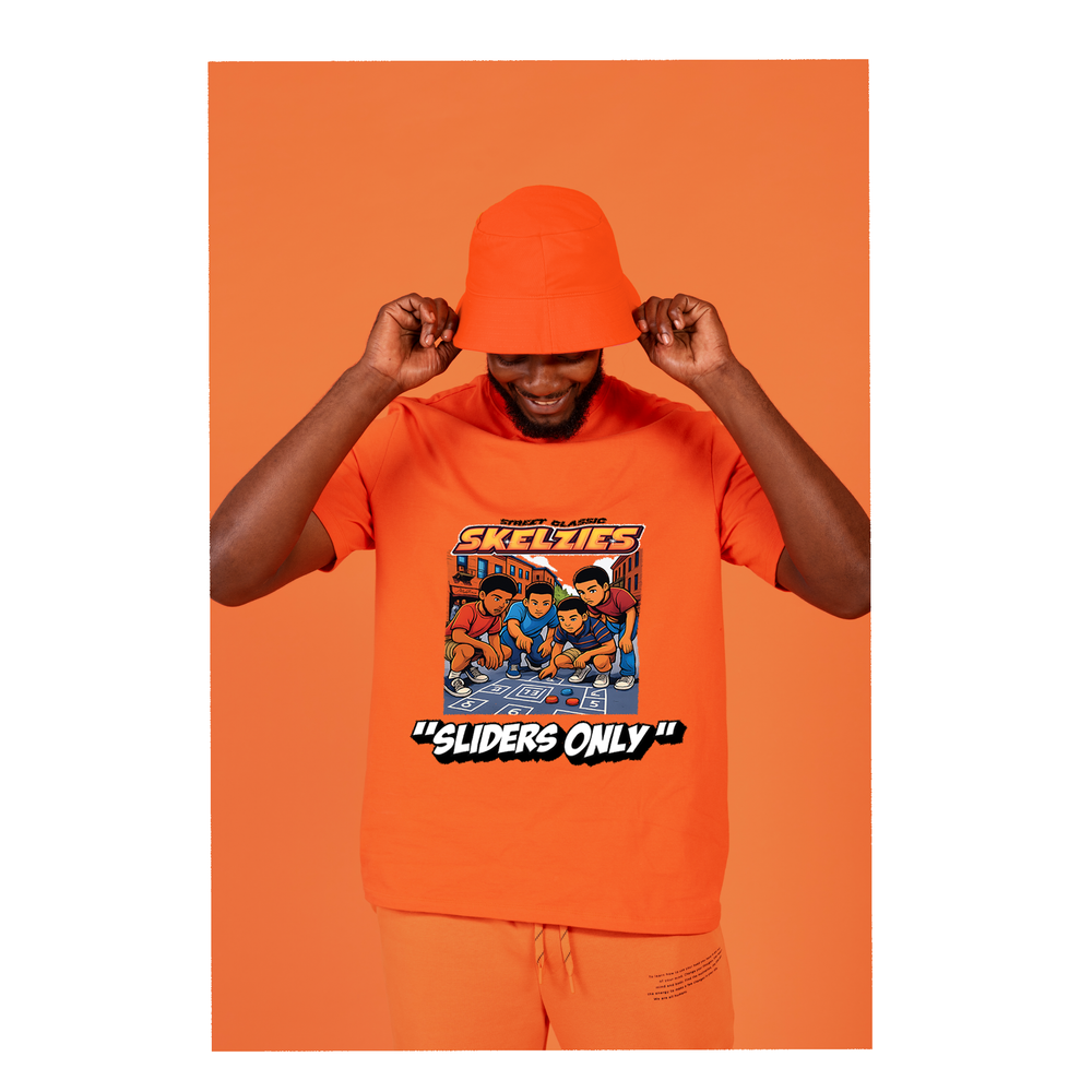 Man wearing a SKELZIES orange t-shirt with a graphic design and text, against an orange background