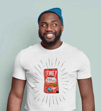 Man wearing a white FIRE SAUCE t-shirt with a graphic design on a light blue background