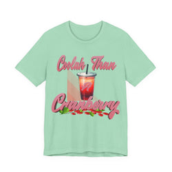 Mint green t-shirt with a graphic of a drink and text on a white background