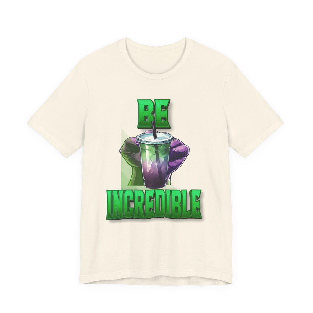 Natural t-shirt with a graphic of a green drink and 'Be Incredible' text on a white background