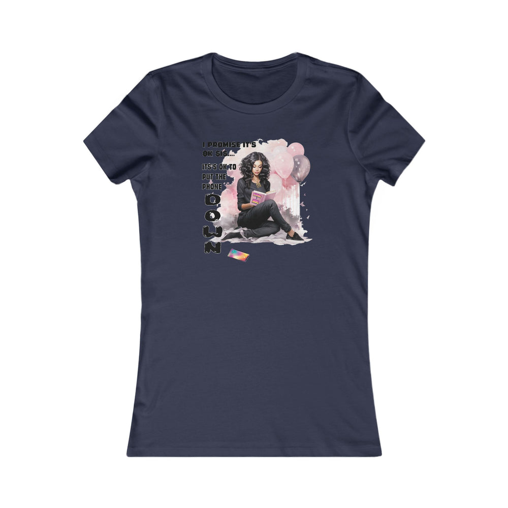 Navy blue t-shirt with a graphic design of a woman sitting on a cloud, surrounded by flowers and text, on a white background.