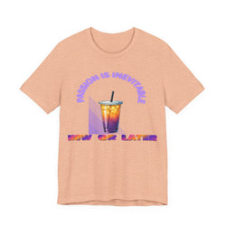 Peach t-shirt with a colorful graphic and text on a white background