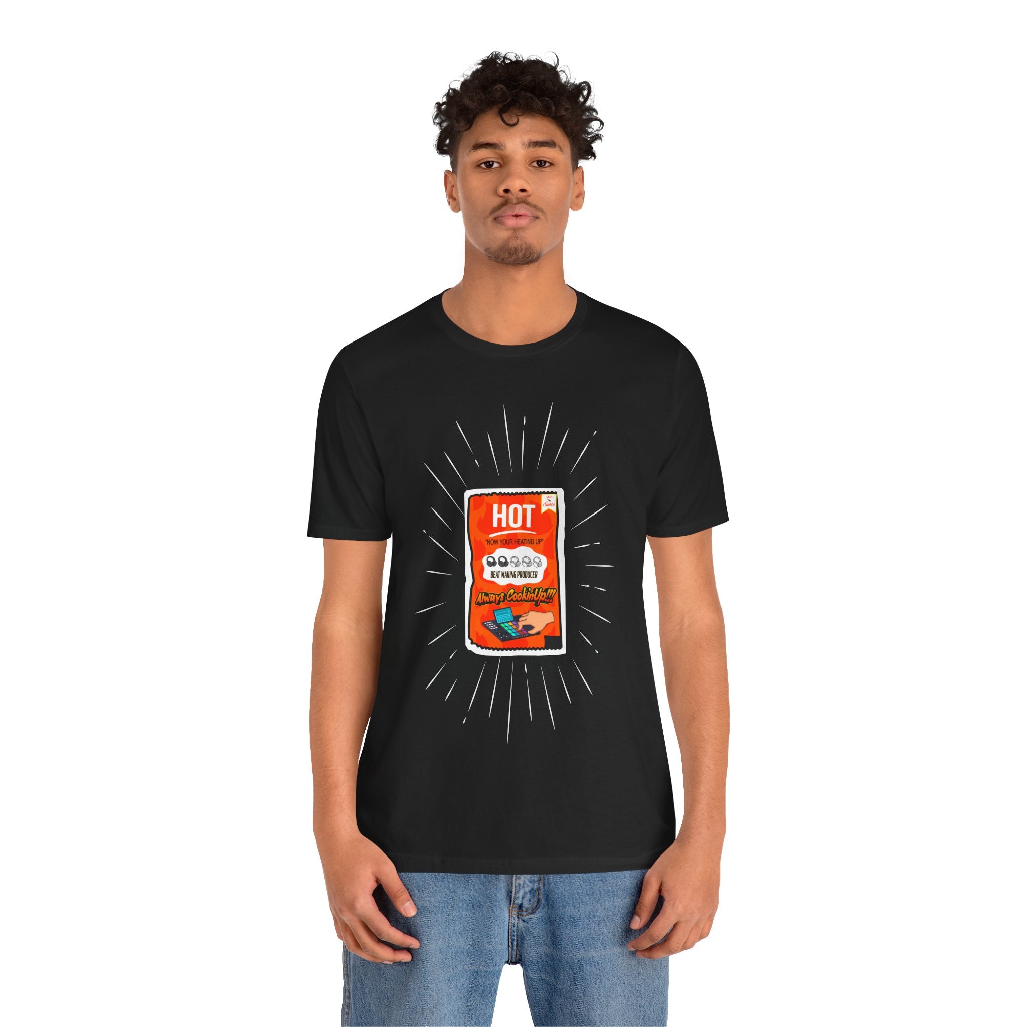 Person wearing a black t-shirt with a graphic design on a white background