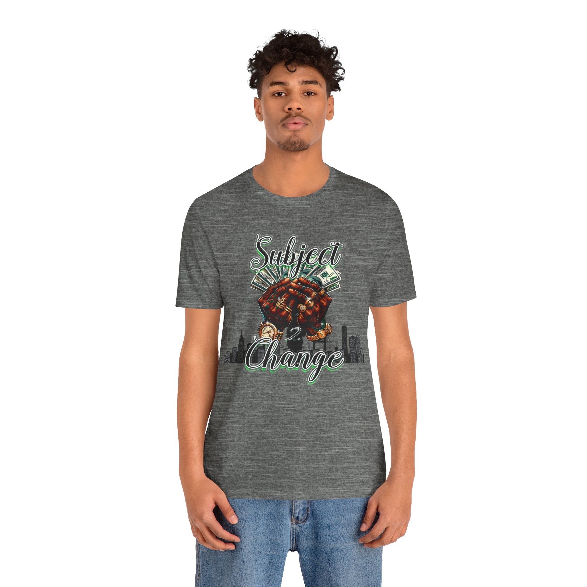 Person wearing a gray t-shirt with a graphic design on a white background
