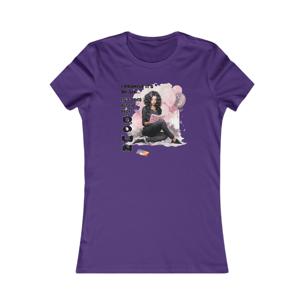 Purple t-shirt with graphic design of a woman reading a book, surrounded by balloons and text on a white background.