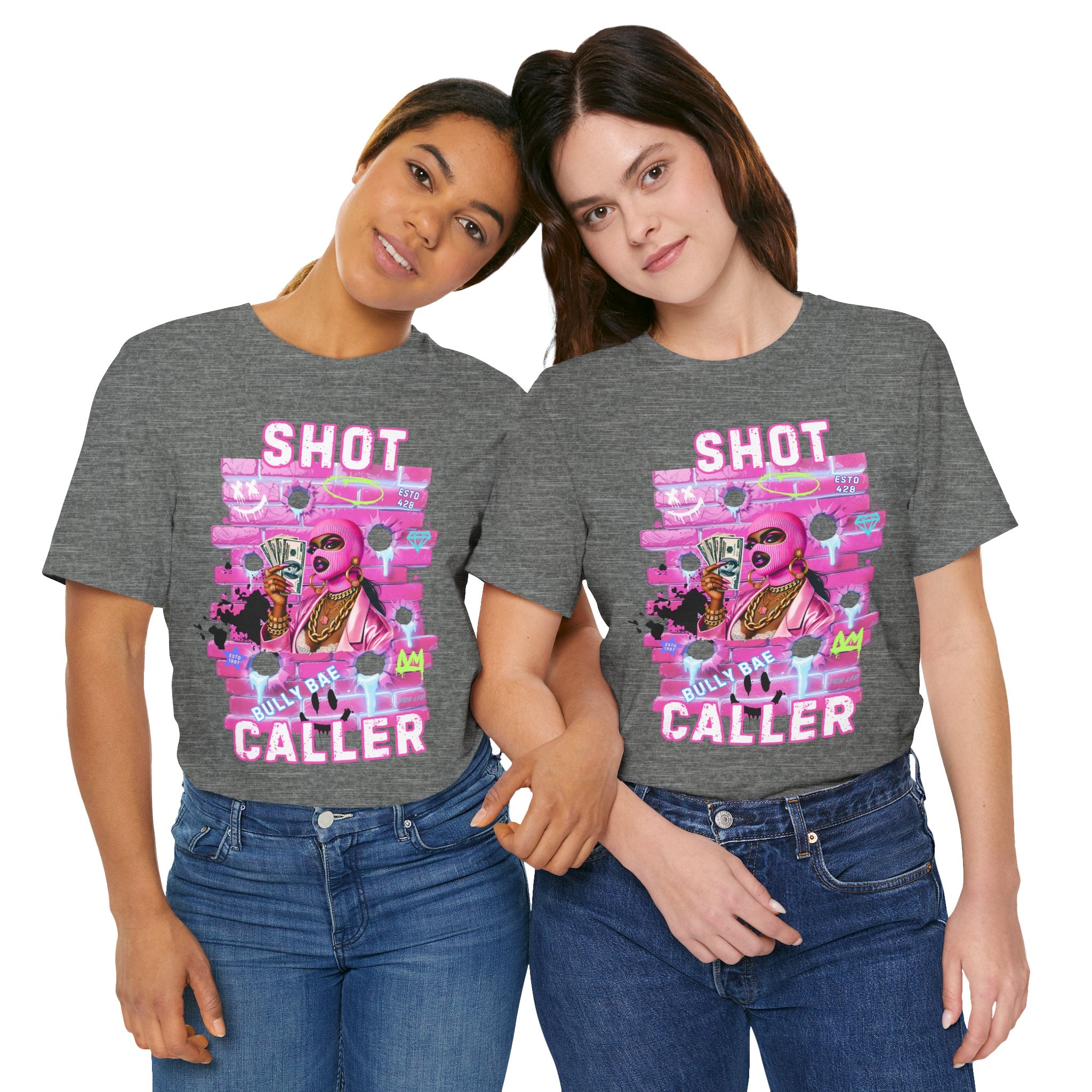 Two people wearing deep heather t-shirts with colorful graphics and text.