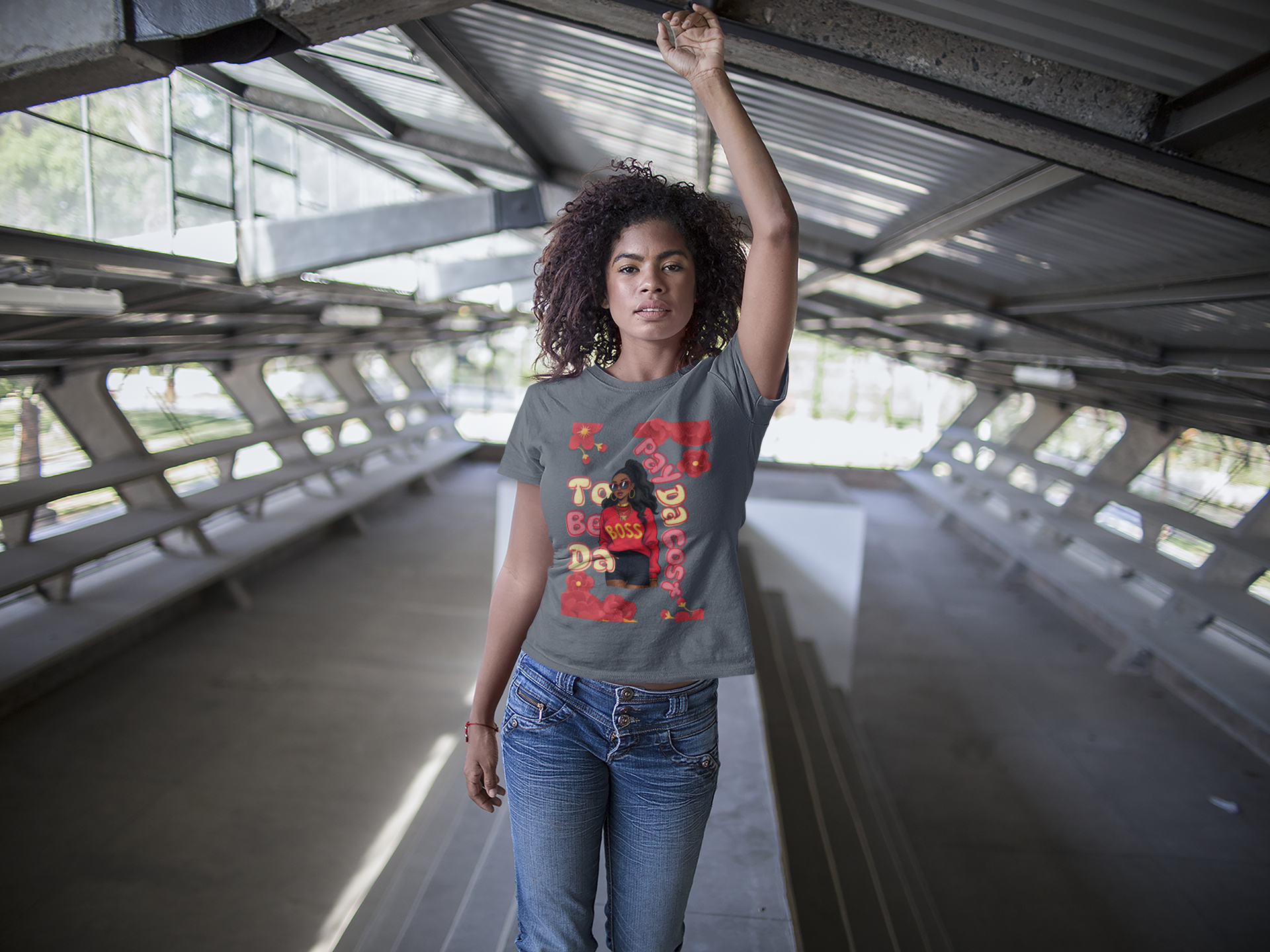 Woman_wearing_a_ASPHALT BOSS_LADY_T-shirt_with_colorful_graphics_and_text_on_a_white_background