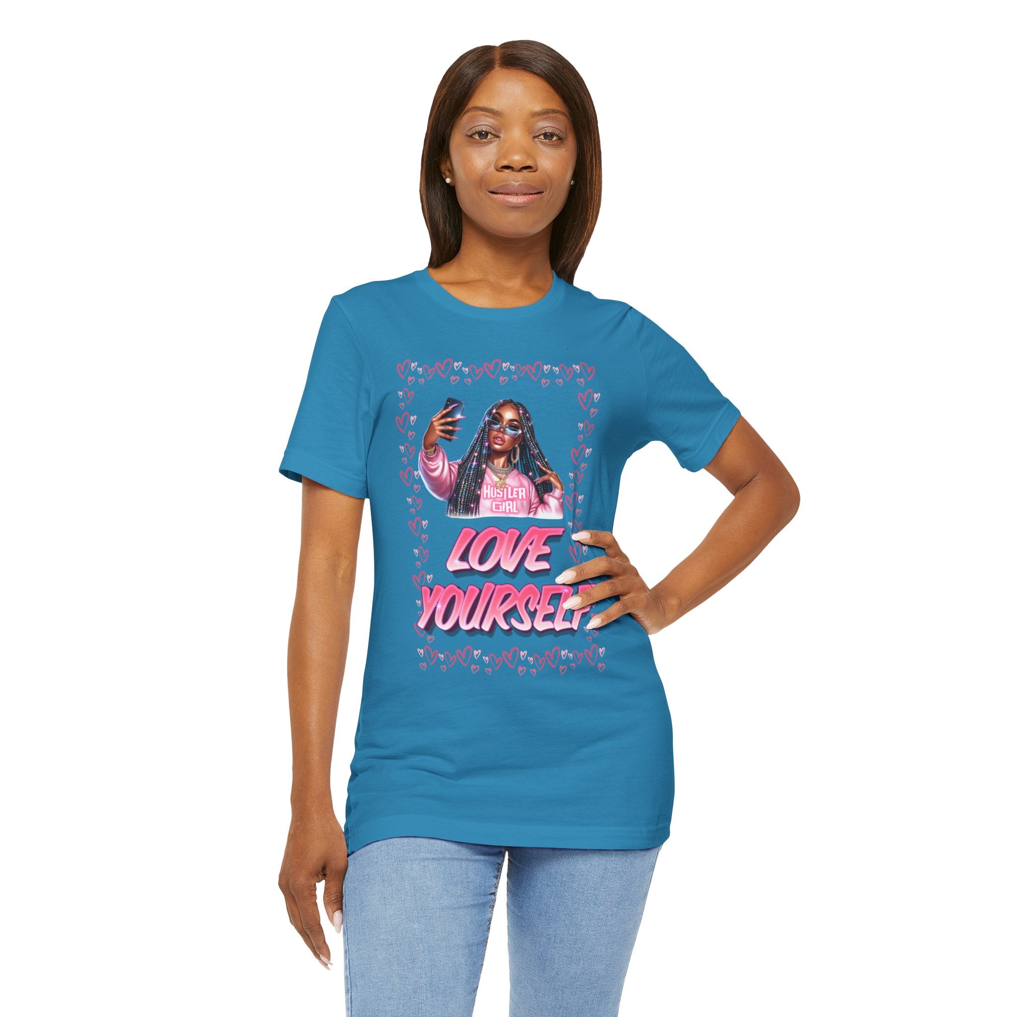 Woman wearing a Aq blue t-shirt with a graphic design and text on a white background