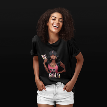 Woman wearing a BE BOLD black t-shirt with a graphic design and text on a black background