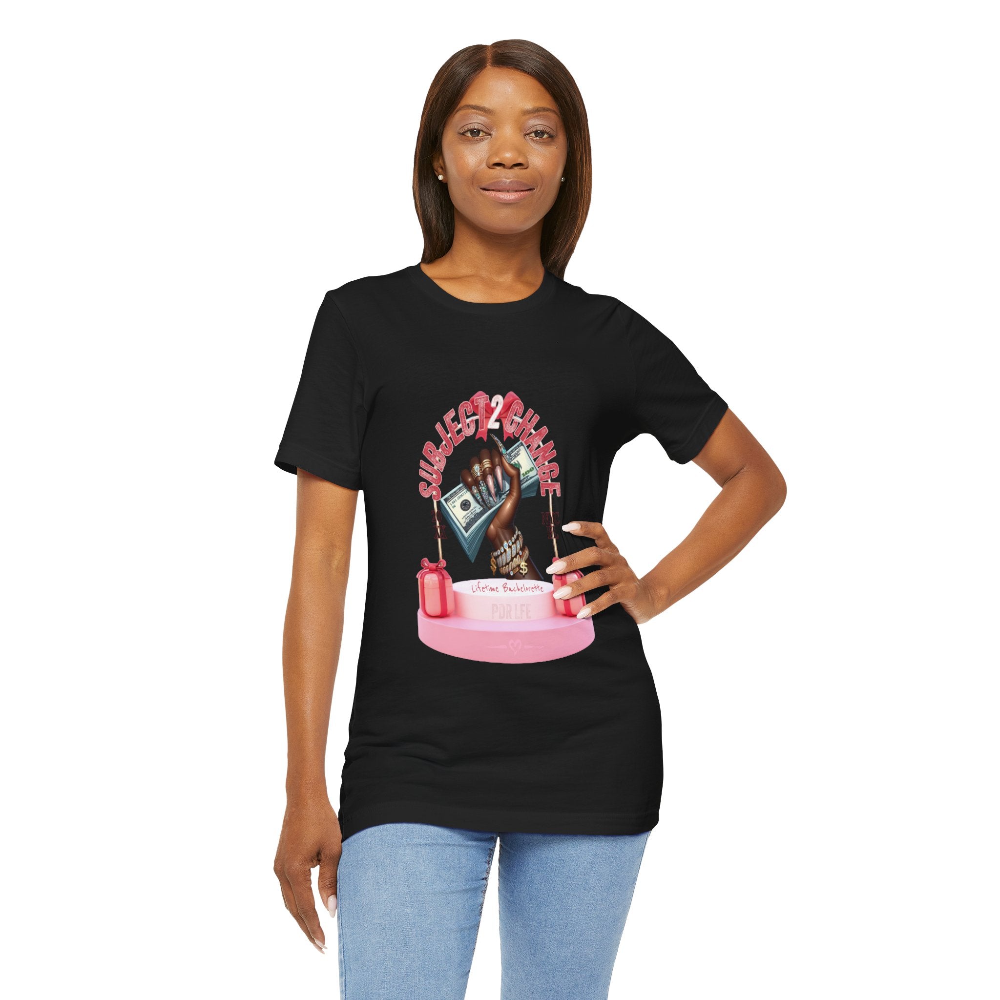 Woman wearing a black t-shirt with a graphic design on a white background